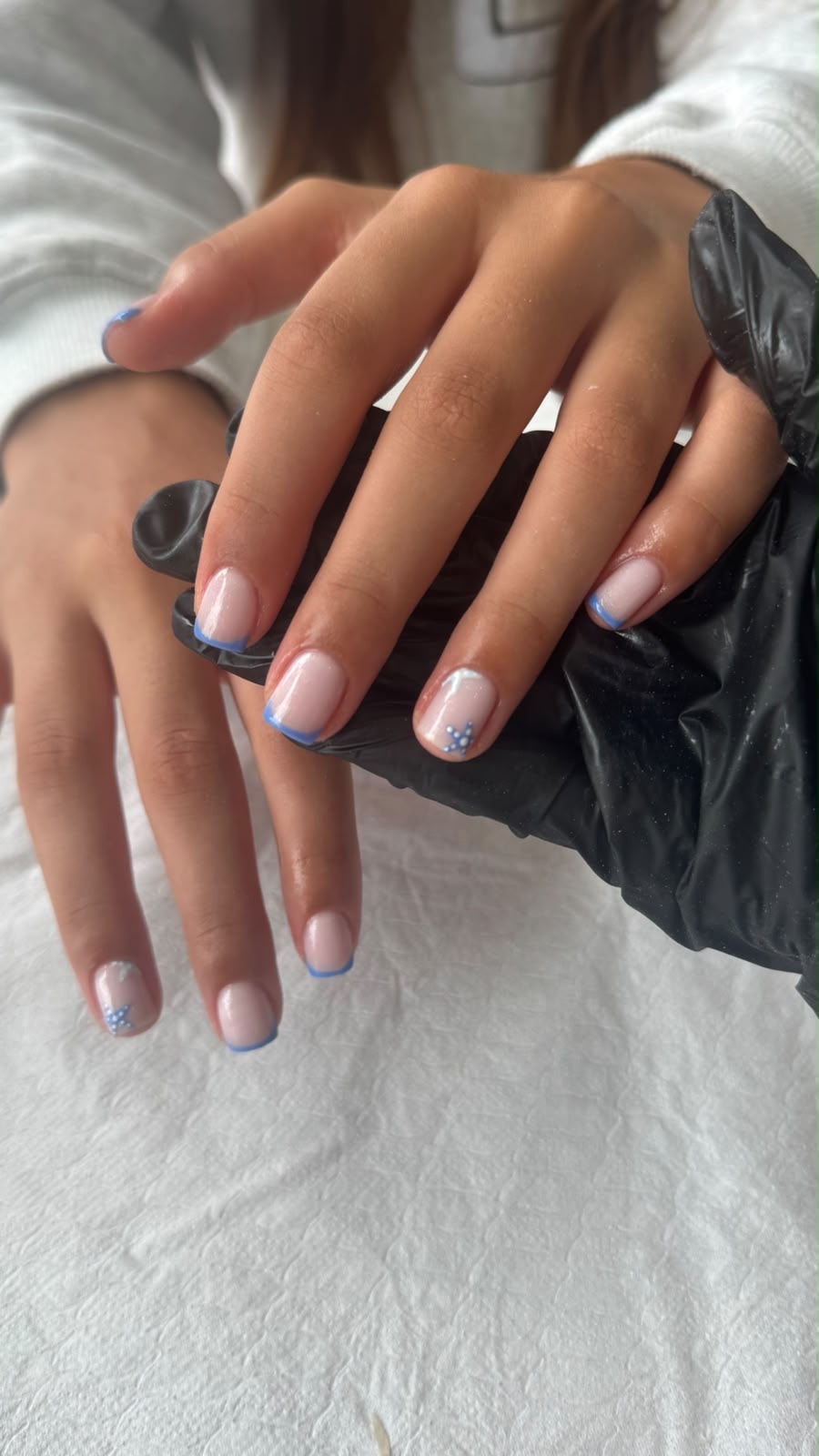 Blue French tips with floral details