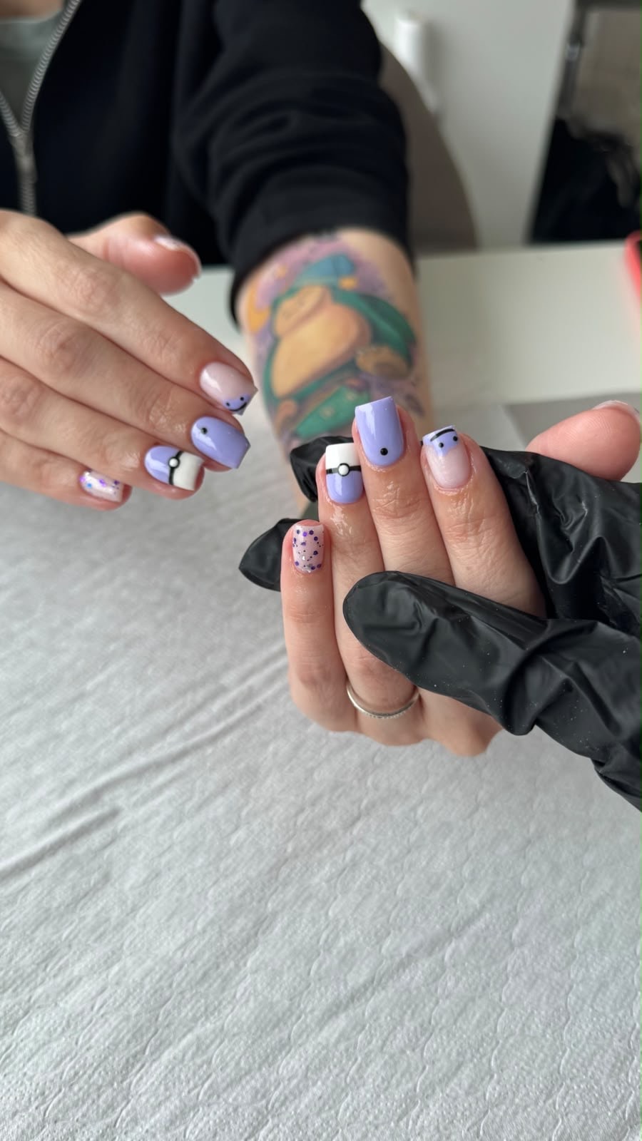 Lilac nails with graphic details